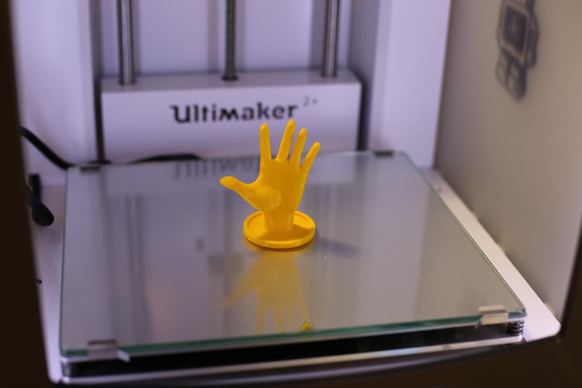 the completed hand from the 3D printer